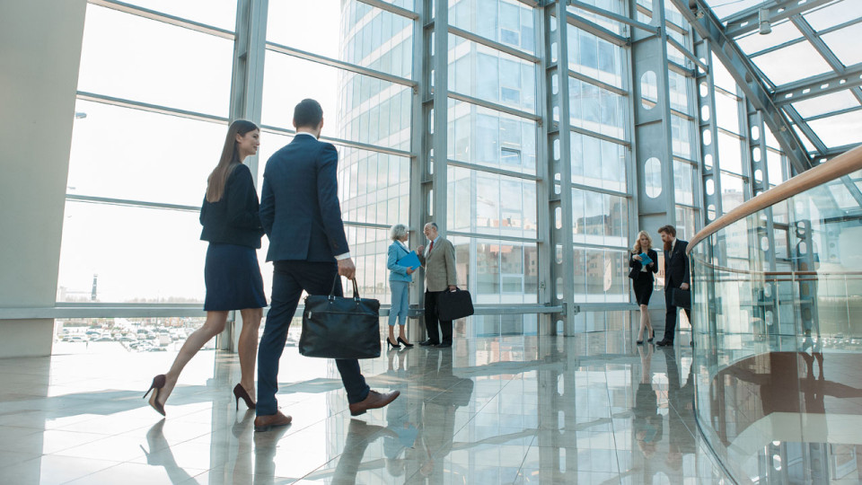 business people walking and talking